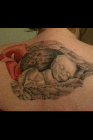 tatouage ange rigolo