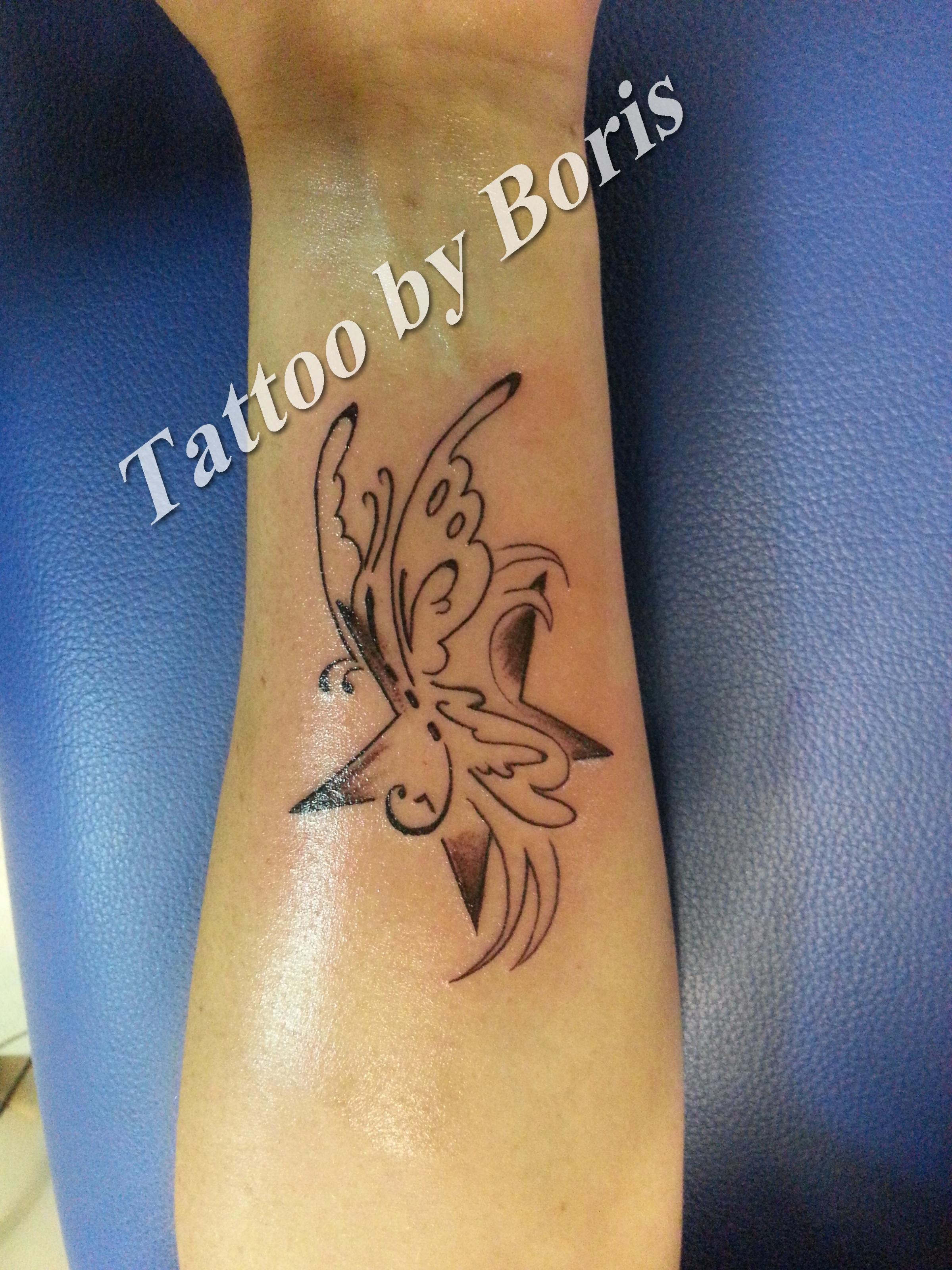 tatouage avant bras etoile