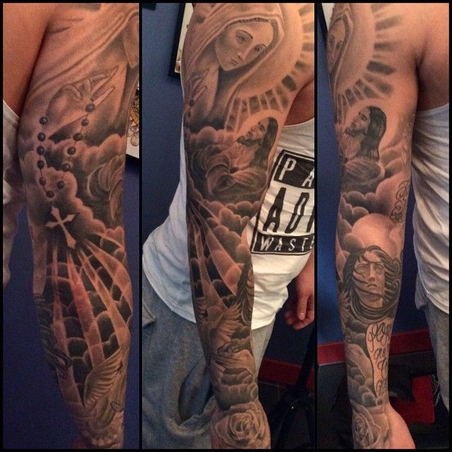 tatouage avant bras religieux