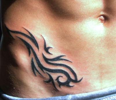 tatouage bas ventre tribal