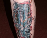 tatouage biomecanique mollet