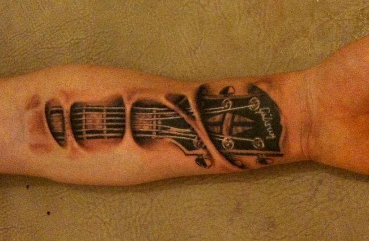 tatouage biomecanique petit