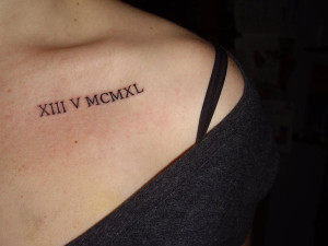 tatouage chiffre romain ventre