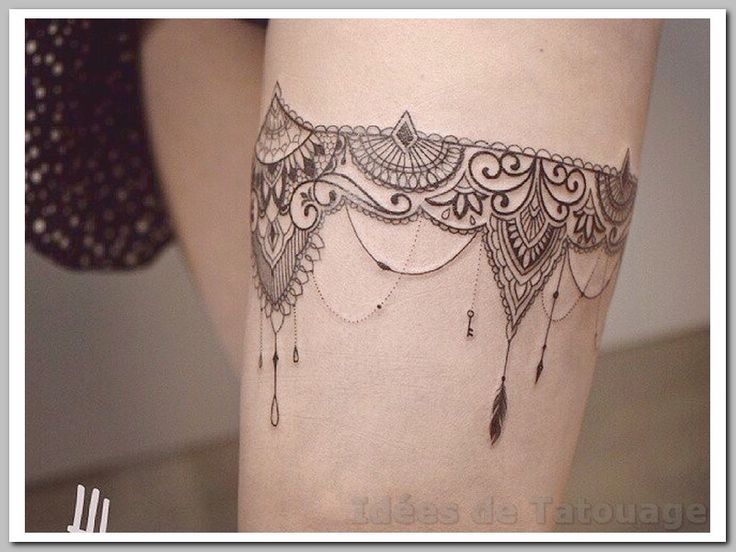 tatouage cuisse femme jarretière