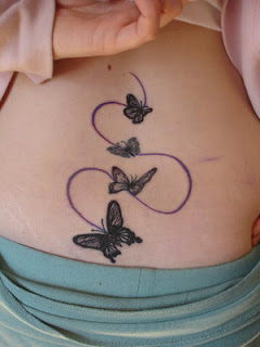 tatouage dos femme papillon