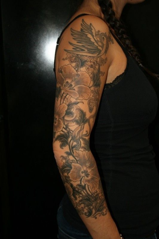 Tatouage fleur bras complet