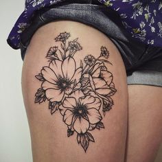 tatouage fleur cuisse