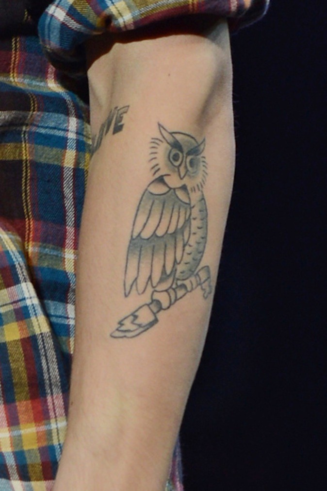 tatouage hibou justin bieber