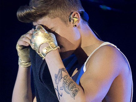 tatouage hibou justin bieber