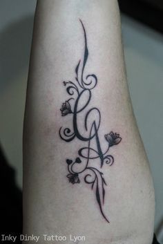 tatouage initiale jb