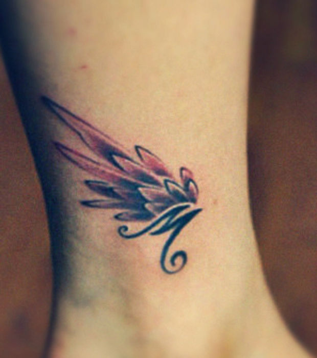 tatouage initiale m