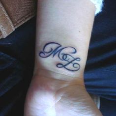 Tatouage initiale ml