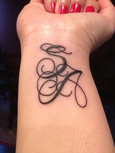 tatouage initiale ml