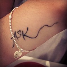 tatouage initiale parent