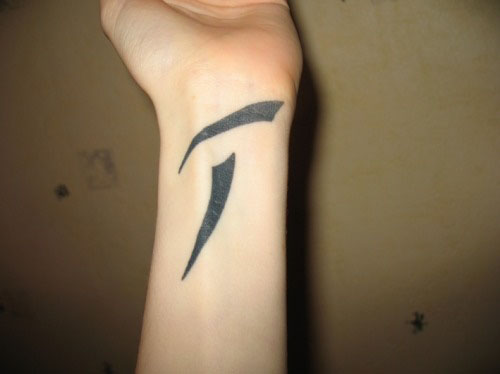 tatouage initiale t
