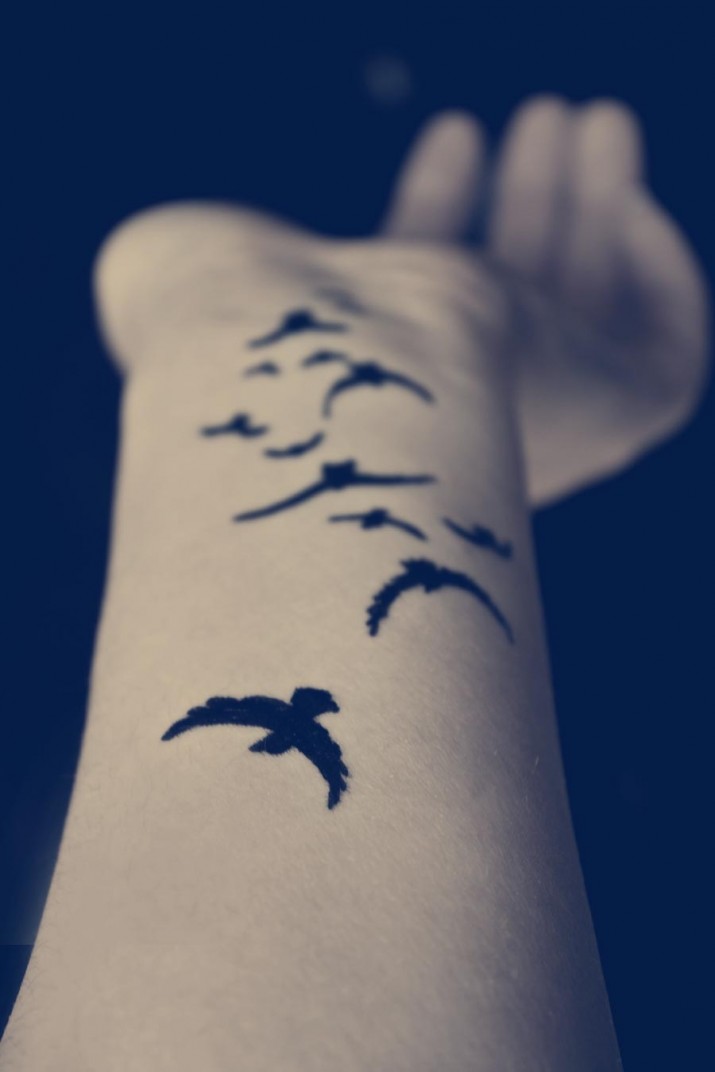 tatouage oiseau bras
