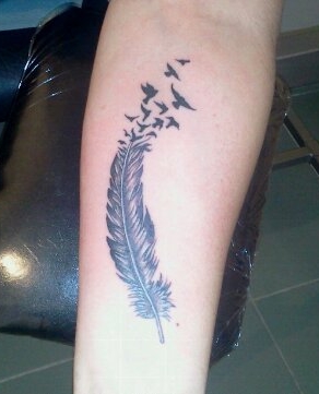 tatouage oiseau bras