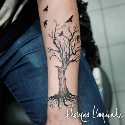 tatouage oiseau bras
