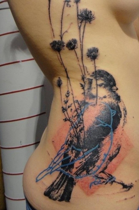 tatouage oiseau cuisse