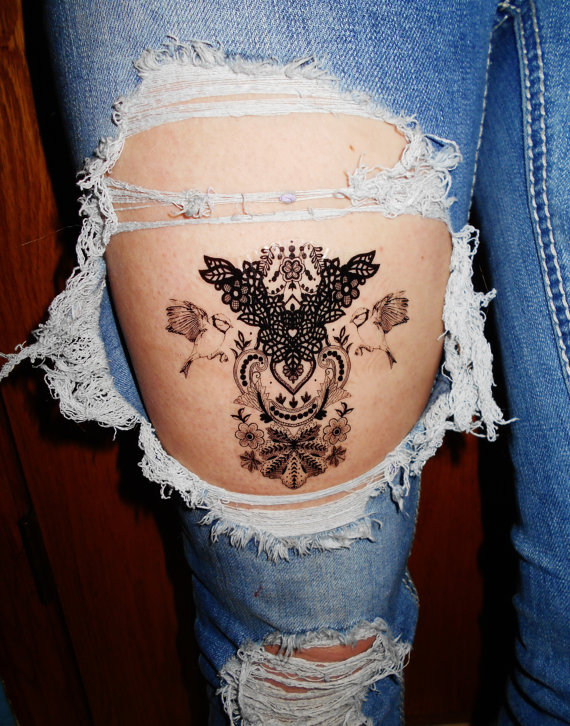 tatouage oiseau en dentelle