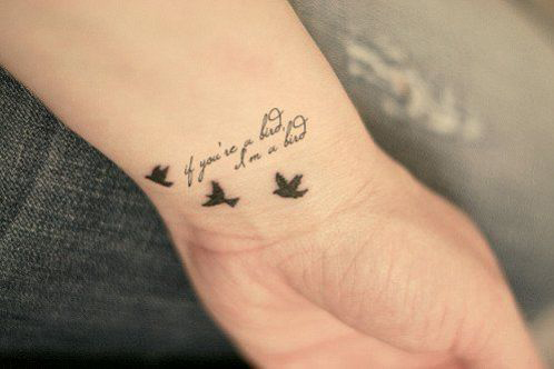 Tatouage oiseau hommage