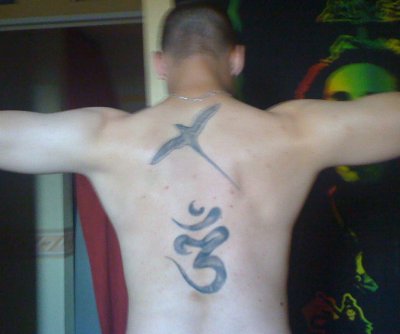 tatouage oiseau paille en queue