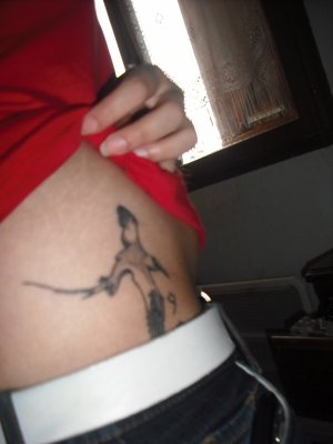tatouage oiseau paille en queue