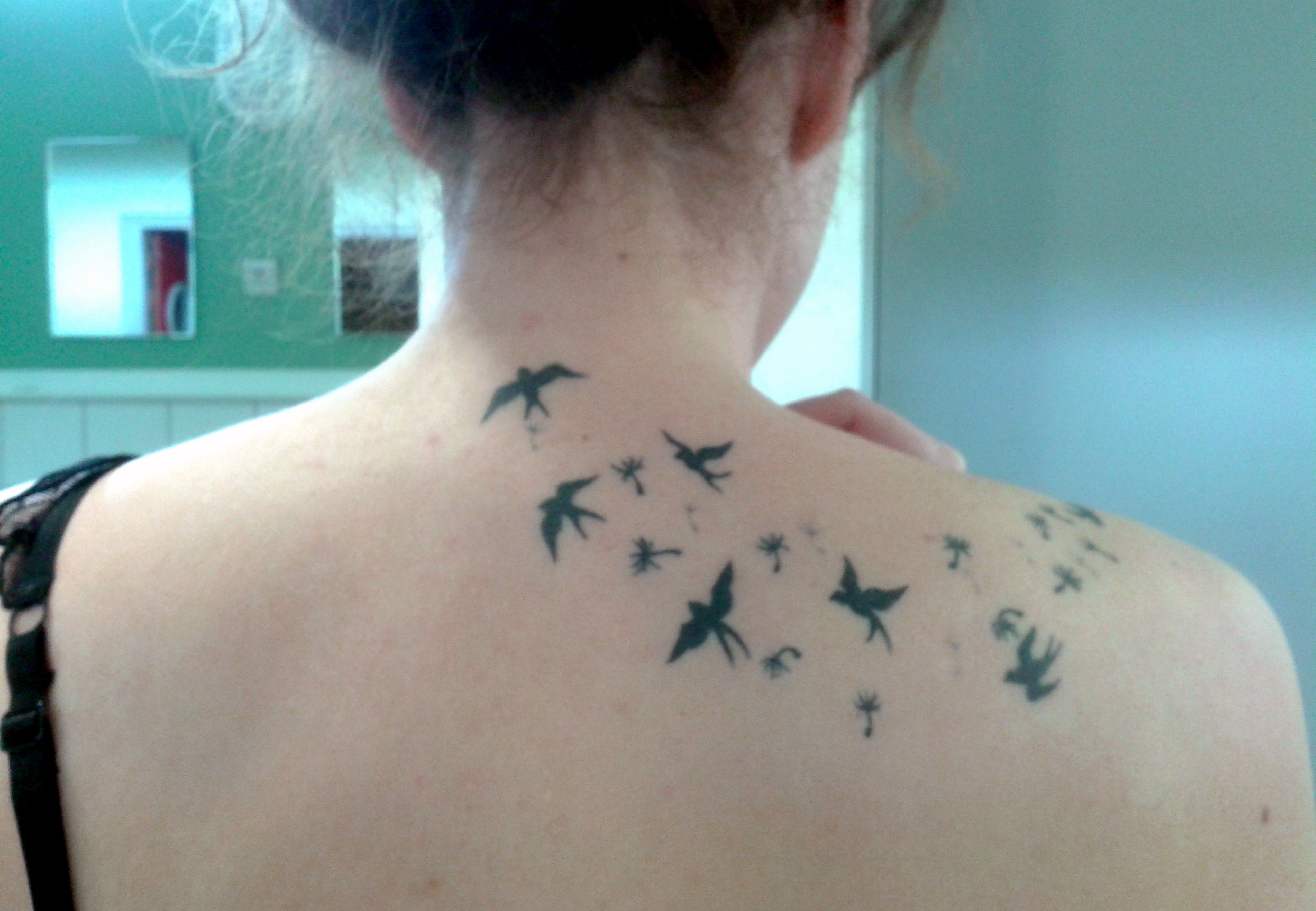 tatouage oiseau raté