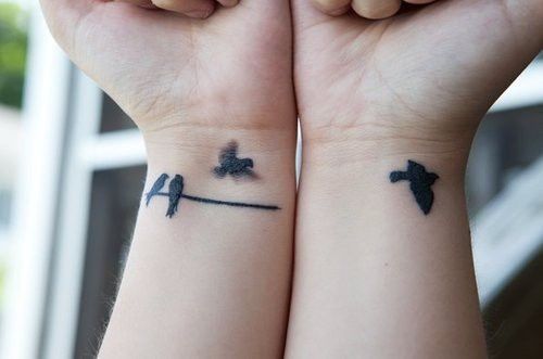 tatouage oiseaux sur une branche