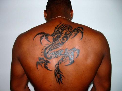 tatouage phoenix tribal dos homme