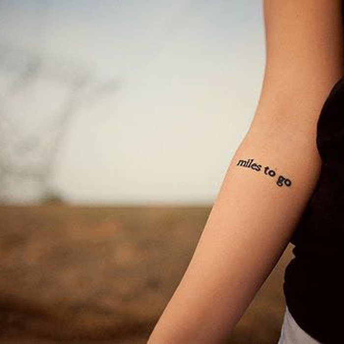 tatouage phrase intérieur bras femme
