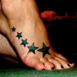 tatouage pied femme etoile