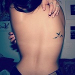 tatouage trefle omoplate