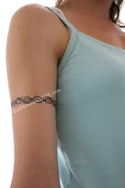 tatouage tribal tour de bras femme