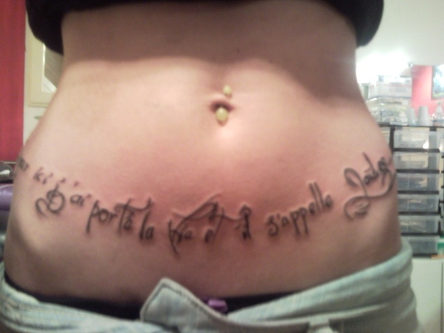 tatouage triskel omoplate