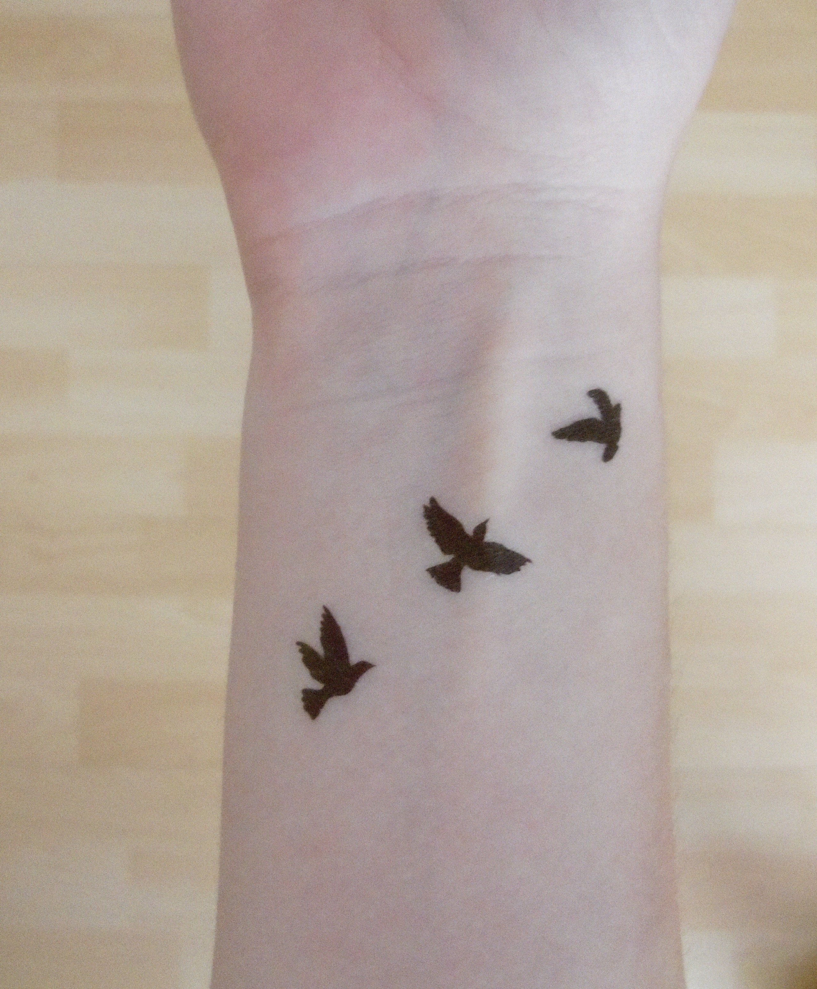 tatouage trois oiseaux
