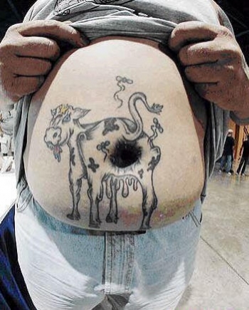 tatouage vache ventre
