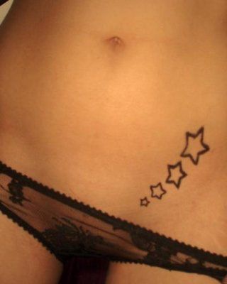 tatouage ventre etoile