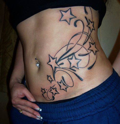 tatouage ventre femme etoile