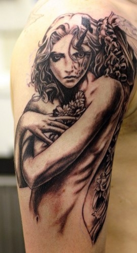 tatouage visage ange et démon