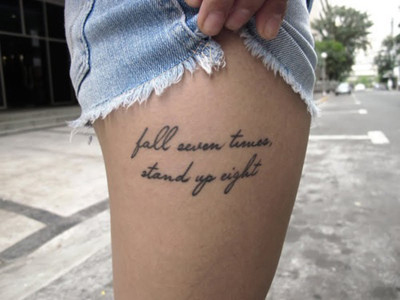tattoo cuisse ecriture