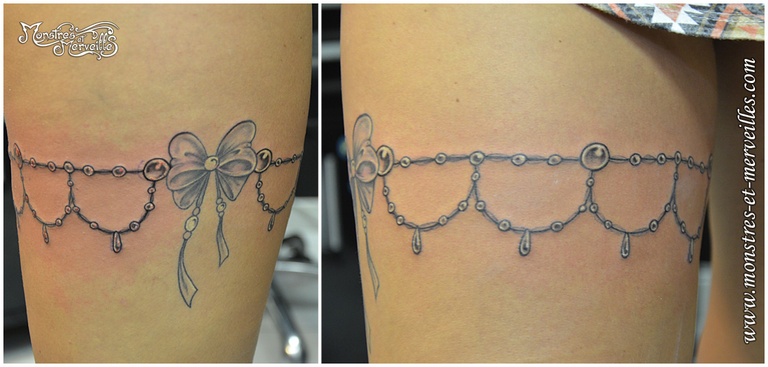 tattoo jarretière noeud